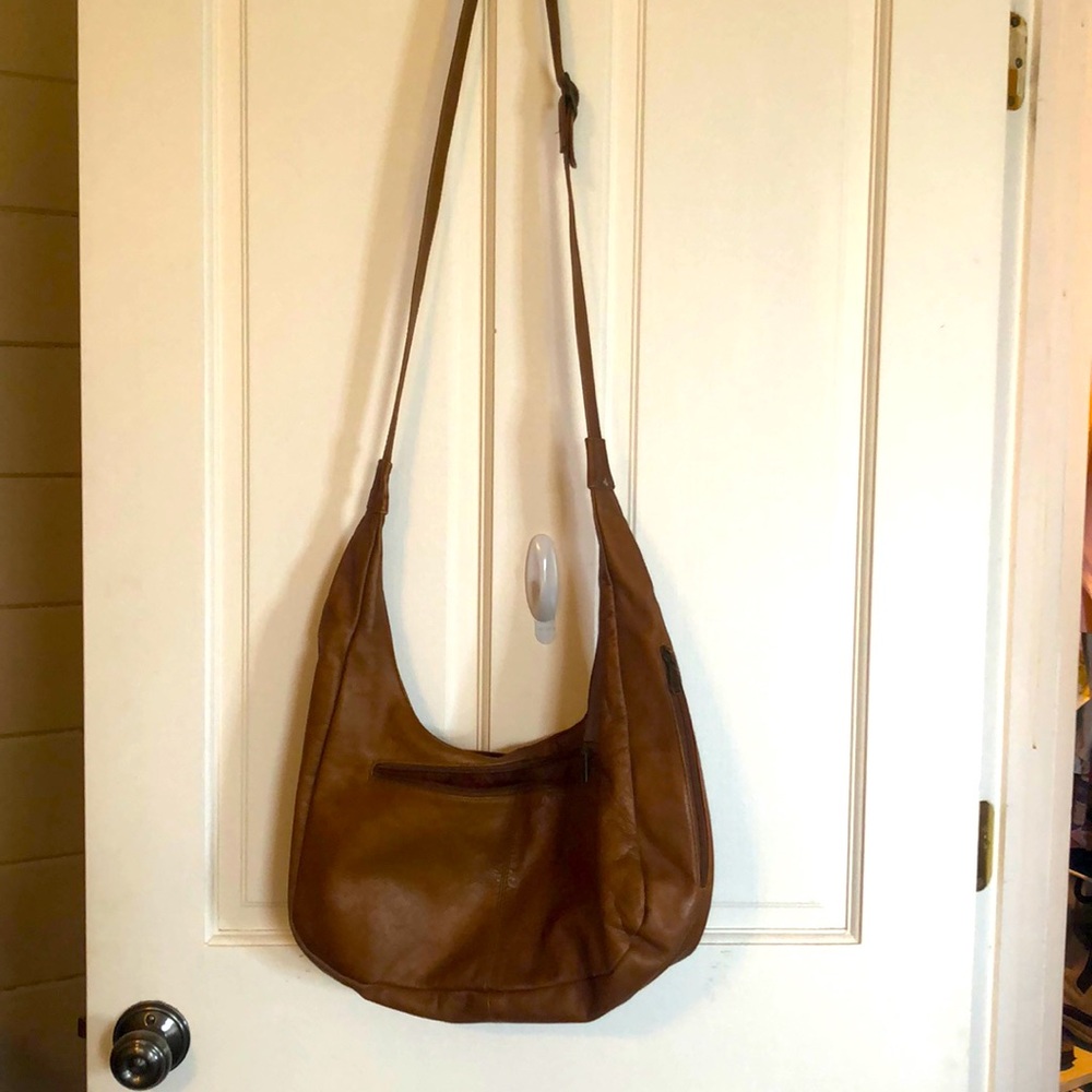 Brown leather conceal carry crossbody bag